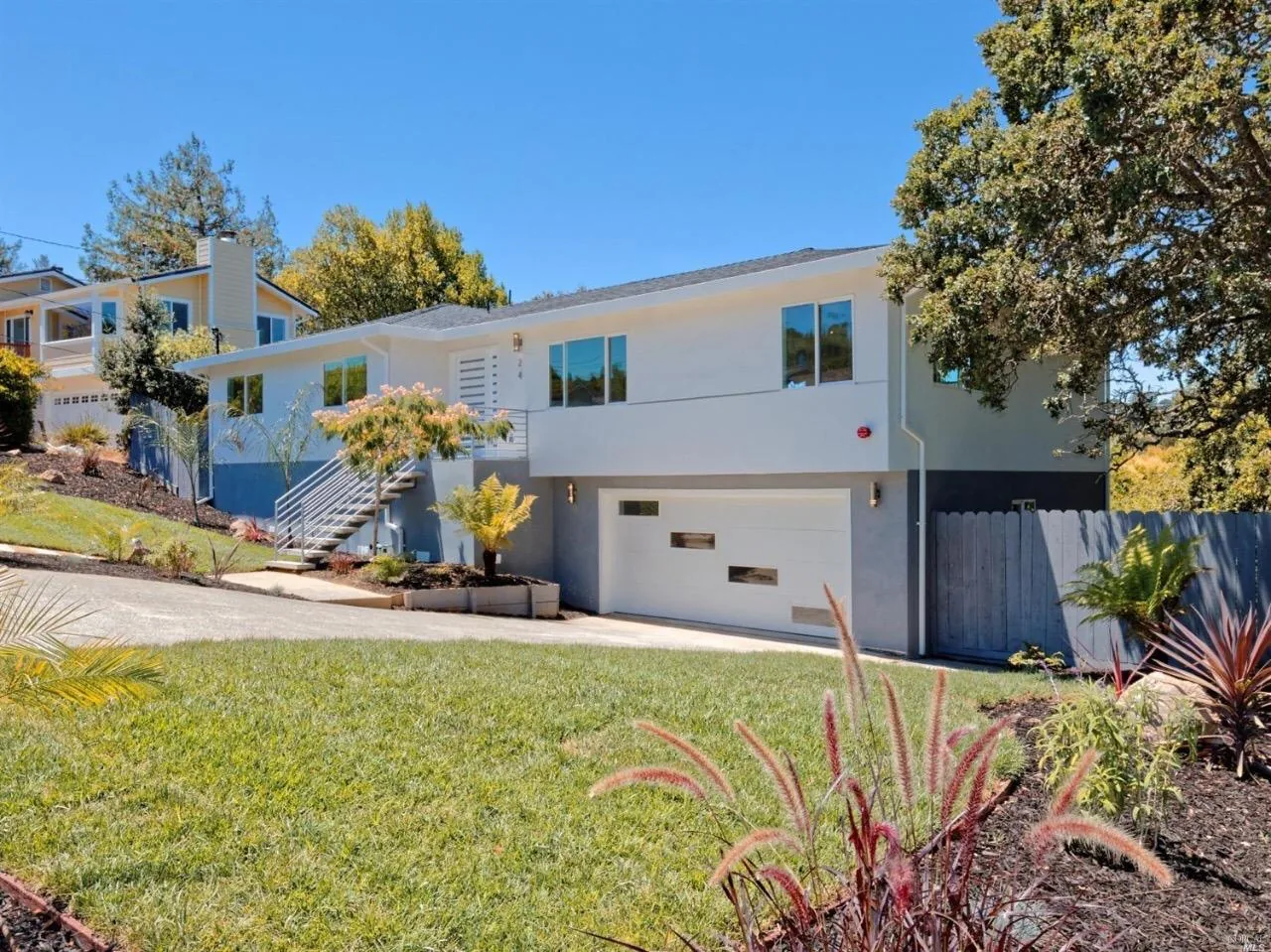 Bright exterior remodel with landscaping